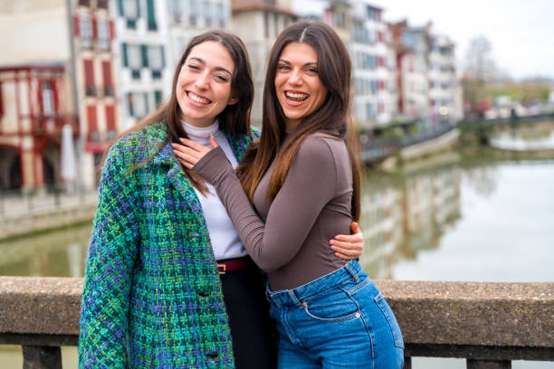 istock Friends visiting a city enjoying standing together 1849194711