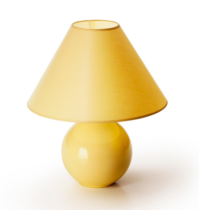 Yellow table lamp on white background