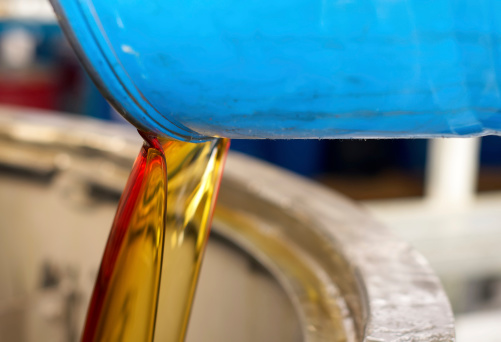 Lubricant oil poured from a barrelMore similar pictures from my portfolio: