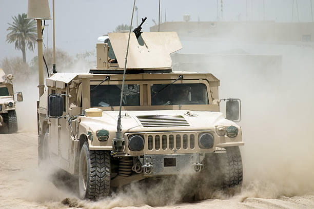 istock Desert war armored tanks going through sandy terrain 184920467
