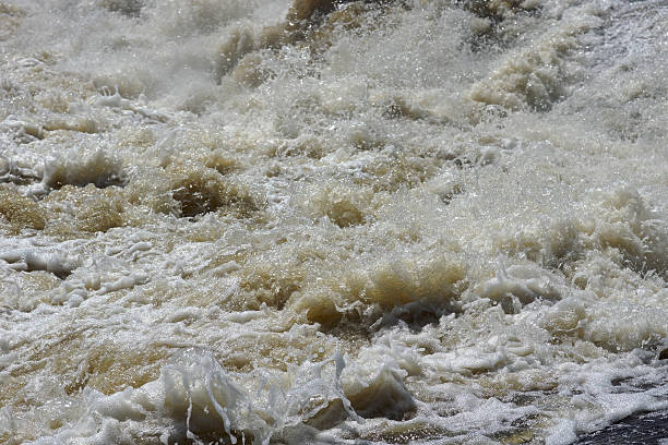 istock Dirt water pollution from flood in Bangkok, Thailand 184921031