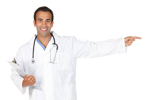 istock Happy male doctor pointing sideways 184921138