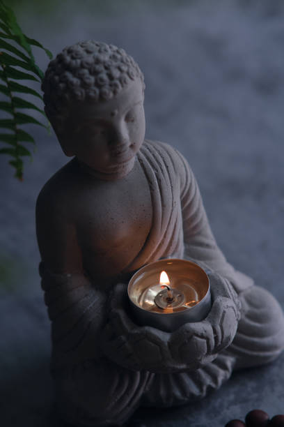 istock a small stone statue of Buddha 1849211751