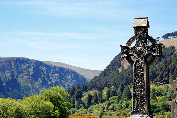 Irish high cross and landscape stock photo