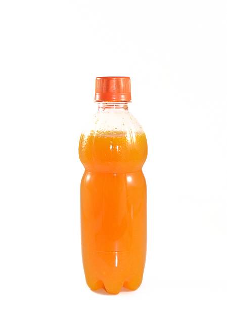istock orange juice in bottle isolated on white 184922204