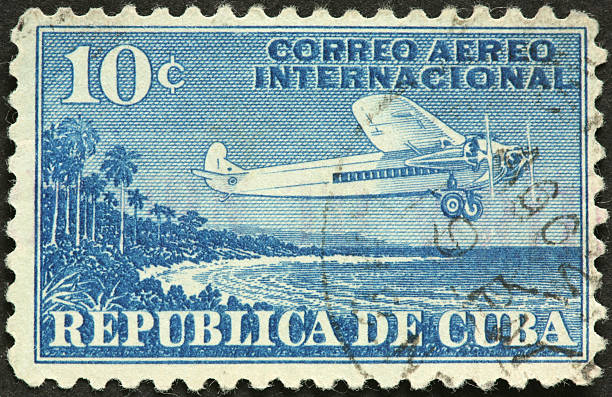 istock vintage airplane on an old Cuban airmail stamp 184922401