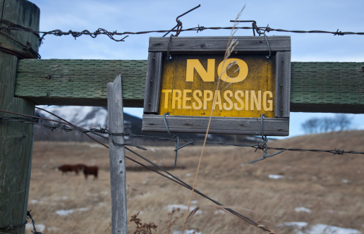 No Trespassing sign on ranch land in Alberta
