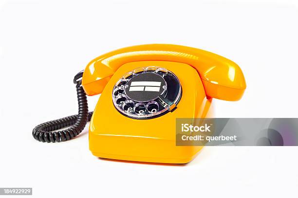 Teléfono Retro Naranja Foto de stock y más banco de imágenes de Teléfono - Teléfono, Usar el teléfono, 1980-1989