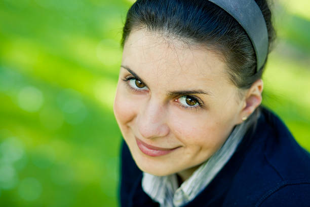 Young girl in park smiling