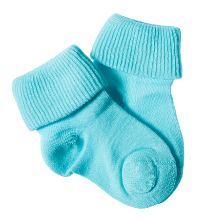 Close-up of blue newborn baby socks