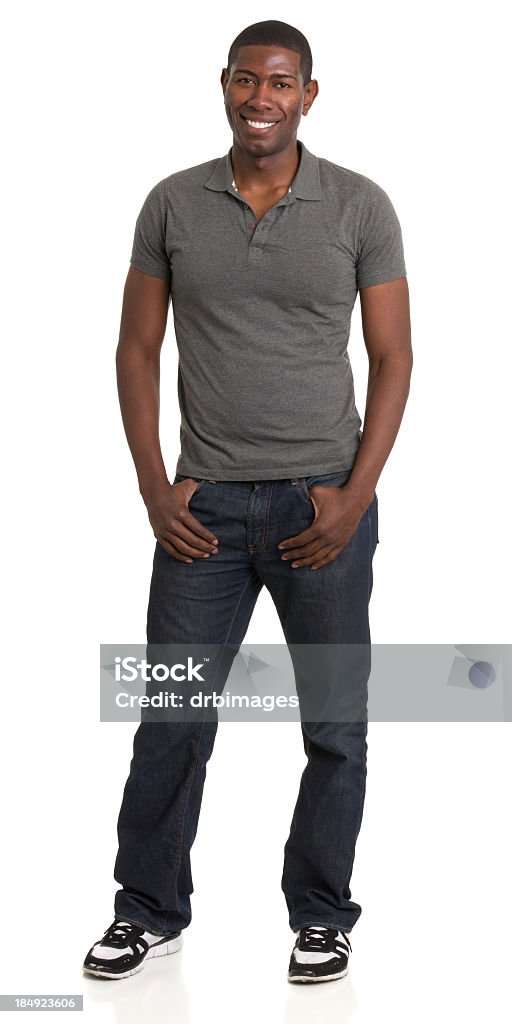 Sonriendo Retrato de hombre joven de pie - Foto de stock de Camisa de polo libre de derechos