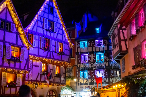 Old town buildings illuminated and decorated like a fairy tale in Christmas festive season in Colmar,Alsace,France