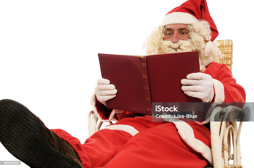 Papai Noel lendo um Book.Isolated. - Foto de stock de Adulto royalty-free