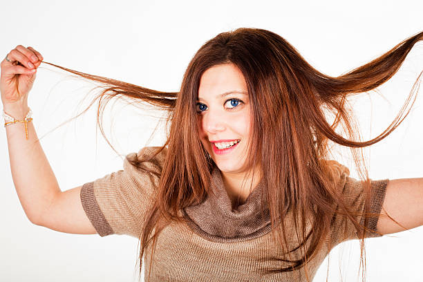 istock Young  Woman pulling her hair 184924297