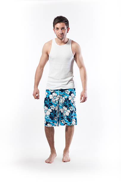 istock young man with shirt and short 184924336