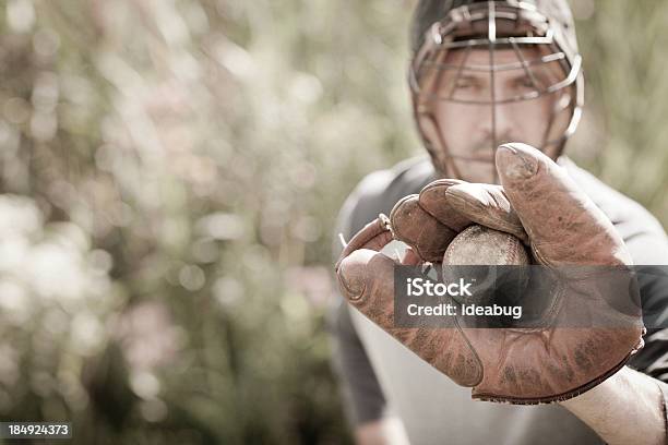 Vintage Baseball Player In Catching Stance With Ball Stock Photo - Download Image Now