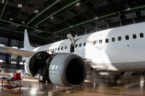 istock White passenger airliner in the aviation hangar 1849243945
