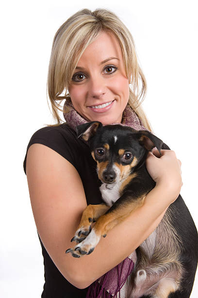 istock Woman Holding Her Dog 184924643
