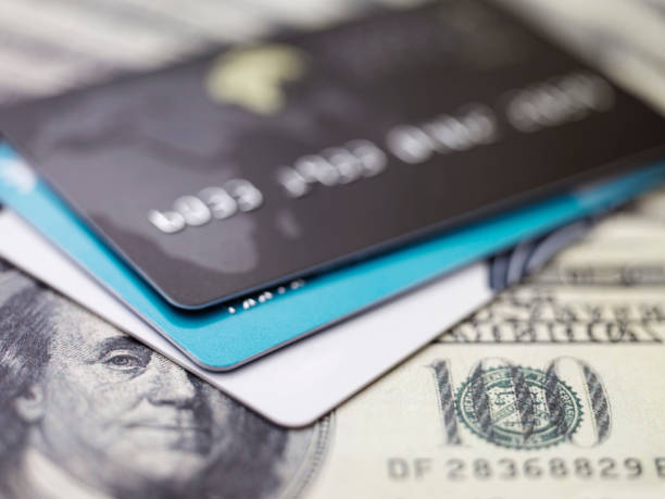 istock credit cards on dollars 184924807