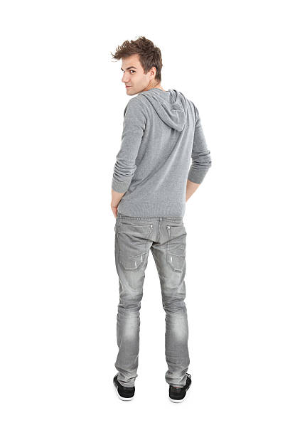 istock young handsome man in grey blouse 184924851