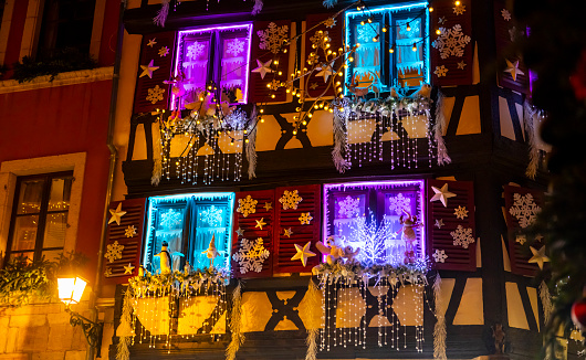 Old town houses illuminated and decorated in Christmas festive season in Colmar,Alsace,France
