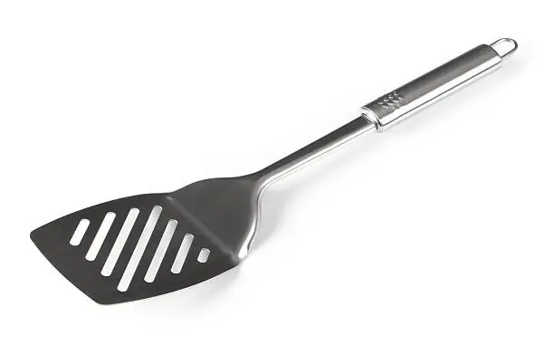 "Stainless steel Spatula on white. This file is cleaned, retouched and contains"