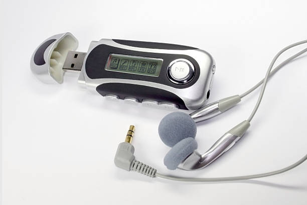 istock Digital audio MP3 player USB key with headphones 184925211