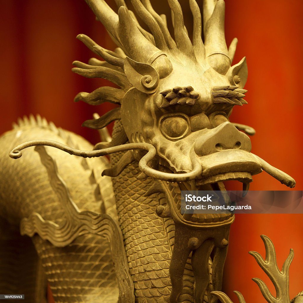 Ancient and golden chinese dragon Golden chinese dragon. 2012 is the year of the dragon Ancient Stock Photo