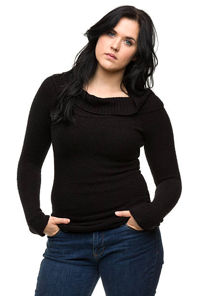 istock Serious Young Woman With Hands in Pockets 184925638