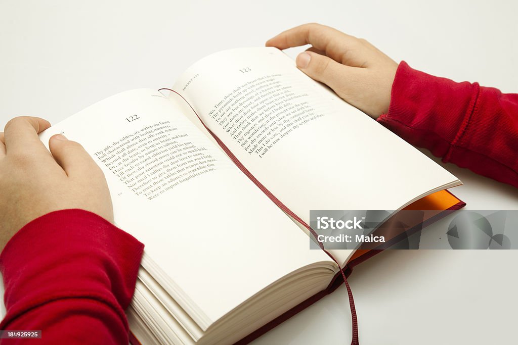 Reading poetry "Girl reading poetry (Text on book: Sonnets, by Shakespeare)" Poetry - Literature Stock Photo