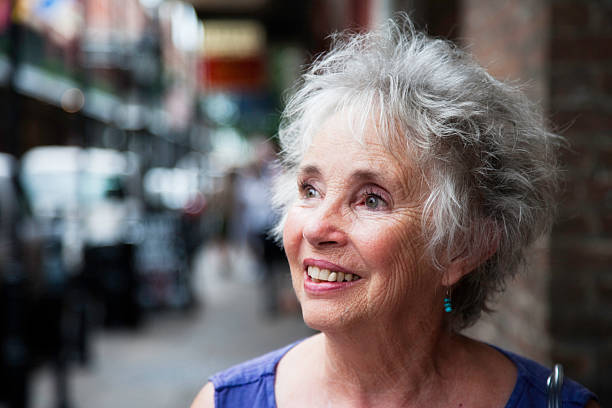 istock Joyful Beautiful Senior Woman in Downtown Urban Setting 184925943