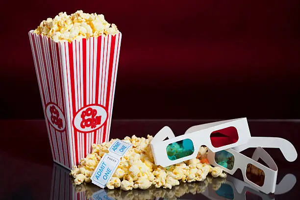 Photo of Popcorn and 3D Movie Glasses