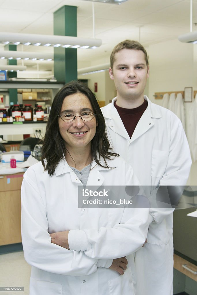 Happy researchers Scientists in a laboratory. Adult Stock Photo