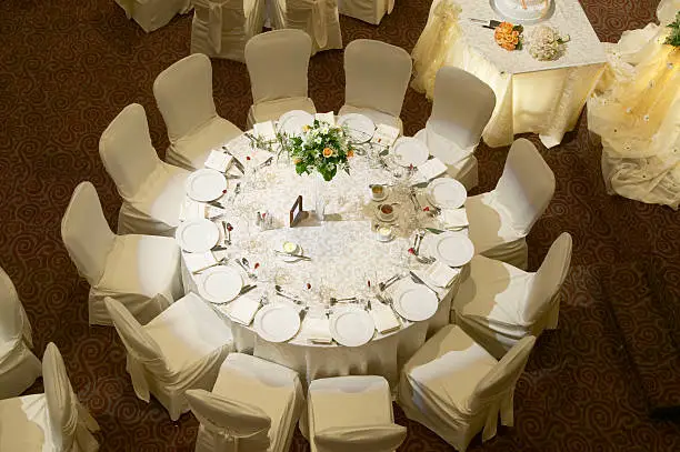 Areal view of the table at the wedding hall dinner party