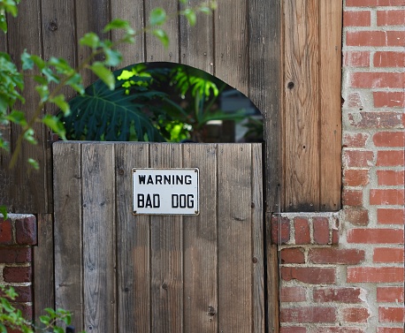 Vintage sign warning about a bad dog