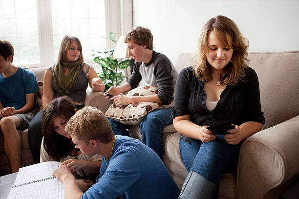 istock Teenage girl texting on a mobile device 184927286