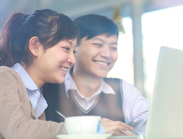 istock happy young people in the cafe 184927467