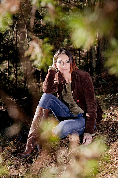 istock Woman sitting in a Park on Mountains 184927504