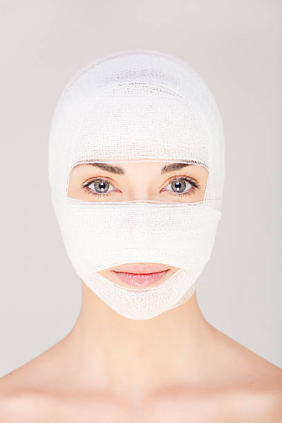 chirurgia della bellezza - plastic surgery bandage surgery women foto e immagini stock