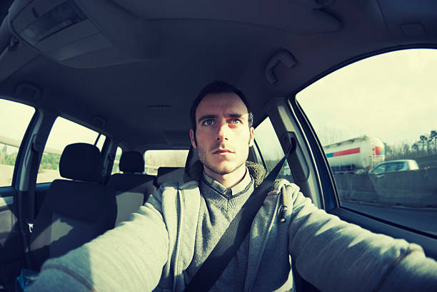 istock Serious man driving his car 184927869