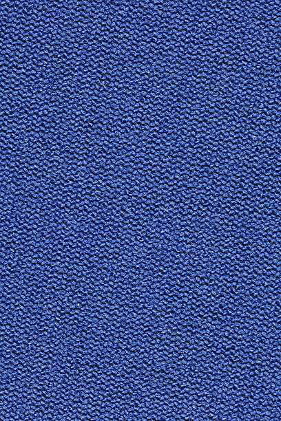 Neoprene is a synthetic rubber material used to cover surfaces (including people) for waterproofing. It is often covered on one or both sides by a nylon fabric layer, such as in this image (the black neoprene is semi-visible in the holes between the nylon stitches when viewed at 100%).