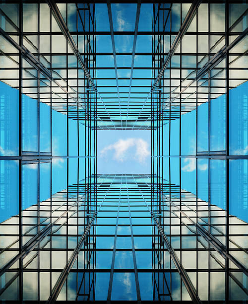 istock Glass facade building seen from below, copy space 184928369