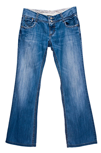 Embroidered flowers on fragment of  blue denim jeans texture