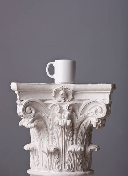 istock white mug on a corinthian capital 184928502