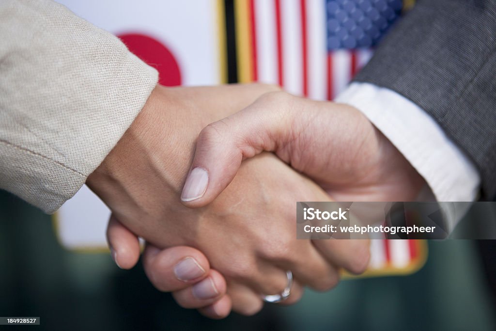 USA- Japão uma cooperação empresarial - Foto de stock de Bandeira royalty-free