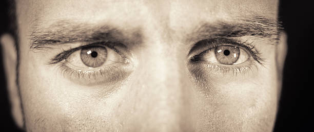 istock Real angry man eye portrait 184929494