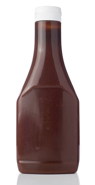 istock Blank bottle containing a brown liquid with a squirt top lid 184929746