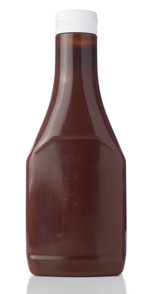 A bottle of brown Sauce bottle isolated on a white background