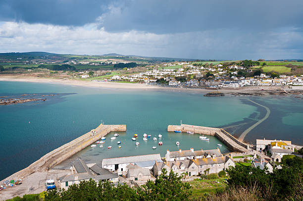 View From St Michael's Mount In Cornwall, England The View From St Michael's Mount Of Penzance In Cornwall England With The Walkway Covered By The High Tide marazion photos stock pictures, royalty-free photos & images