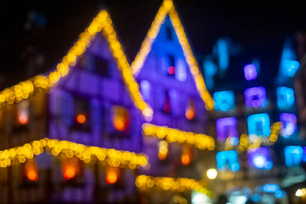 Defocused bokeh of Illuminated Christmas lights on residential building in Colmar,Alsace,France